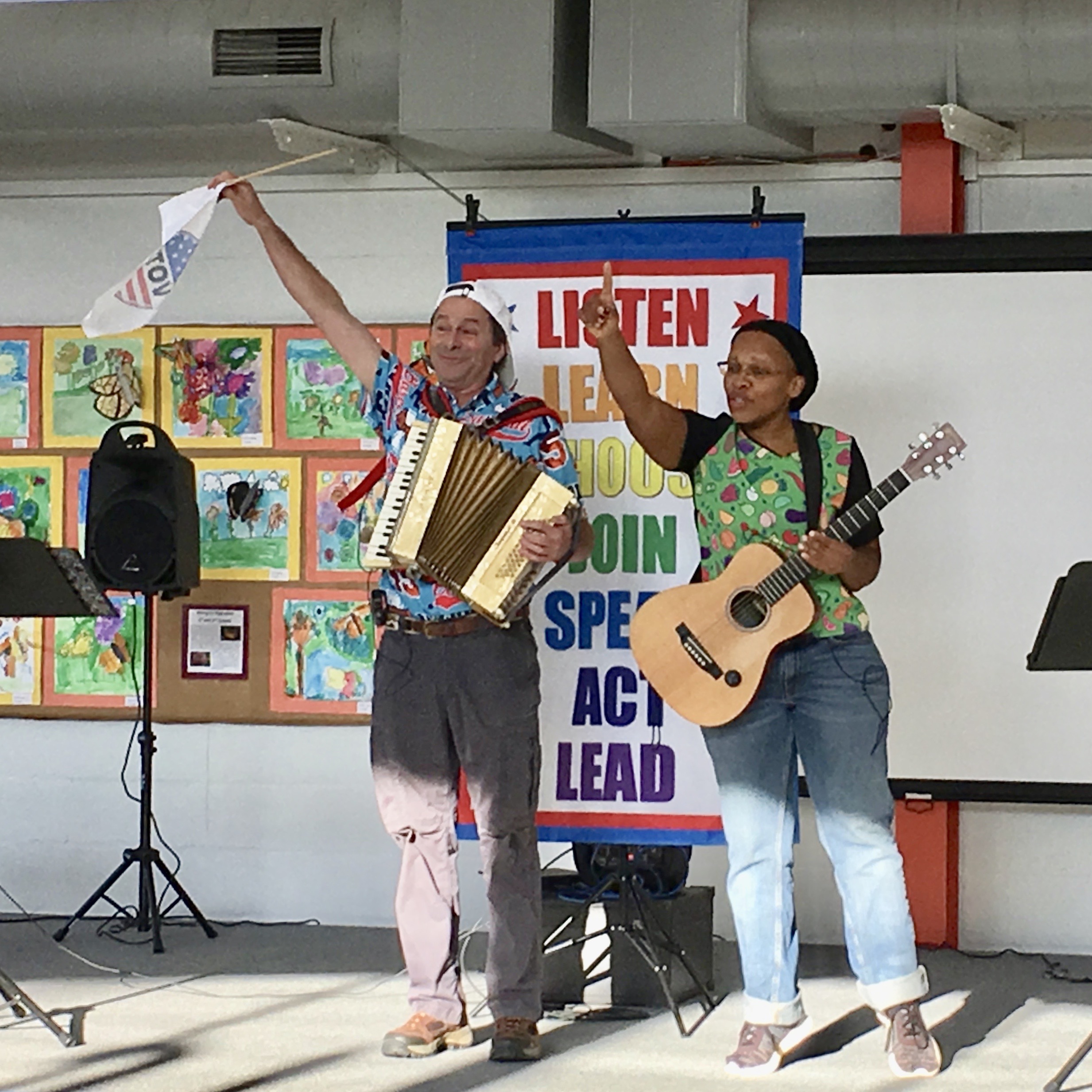 Teaching Artists performing a song