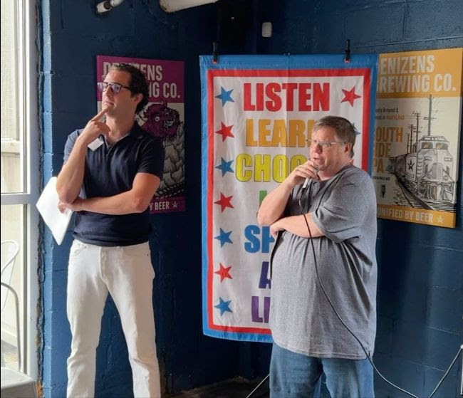 Board Member Trevor Schmutz and Auctioneer Alex Imirie