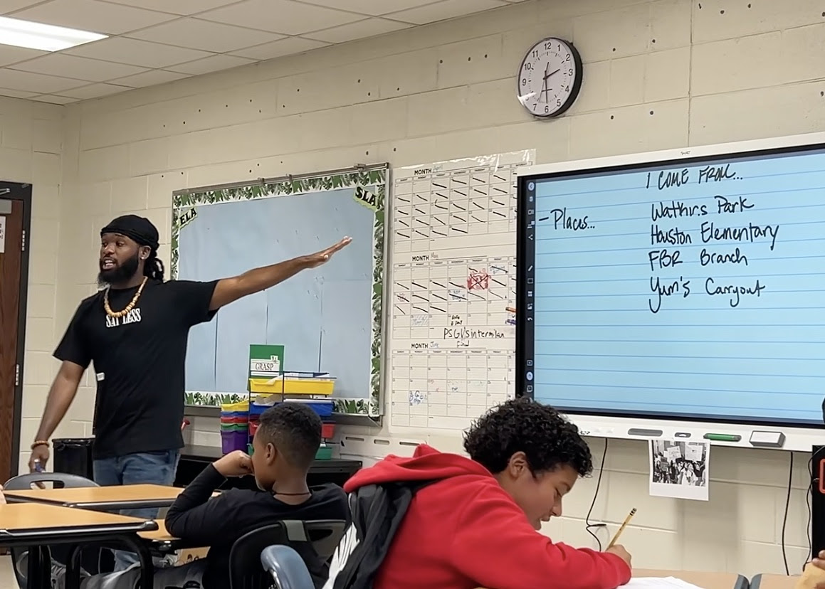 unnamed (2) Students write in their Civic Notebooks with poet Malachi Byrd