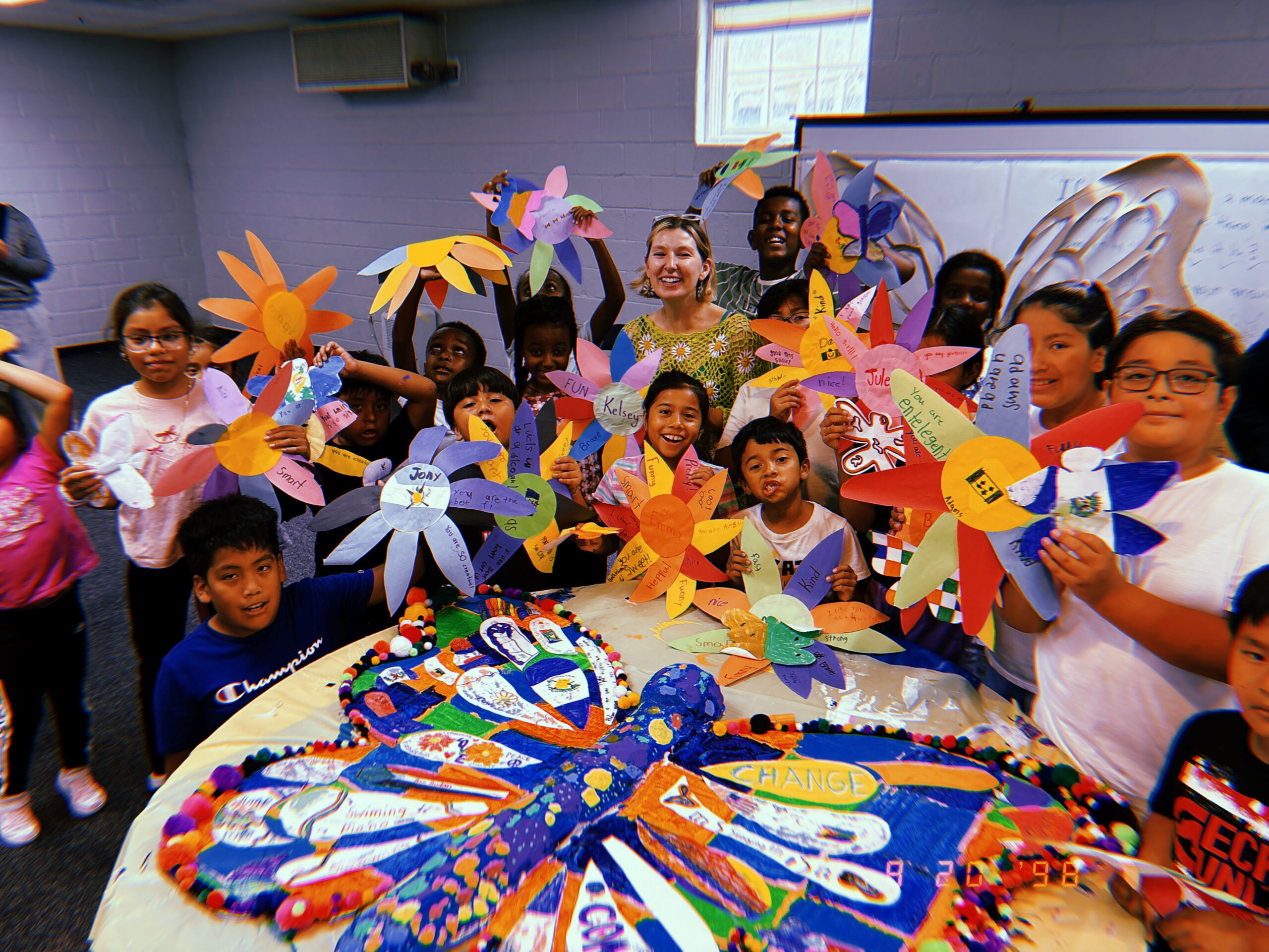 unnamed Campers create a "Butterfly for Change" with teaching artist Kelsey Joyce